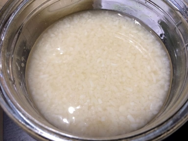 A jar filled with white rice.